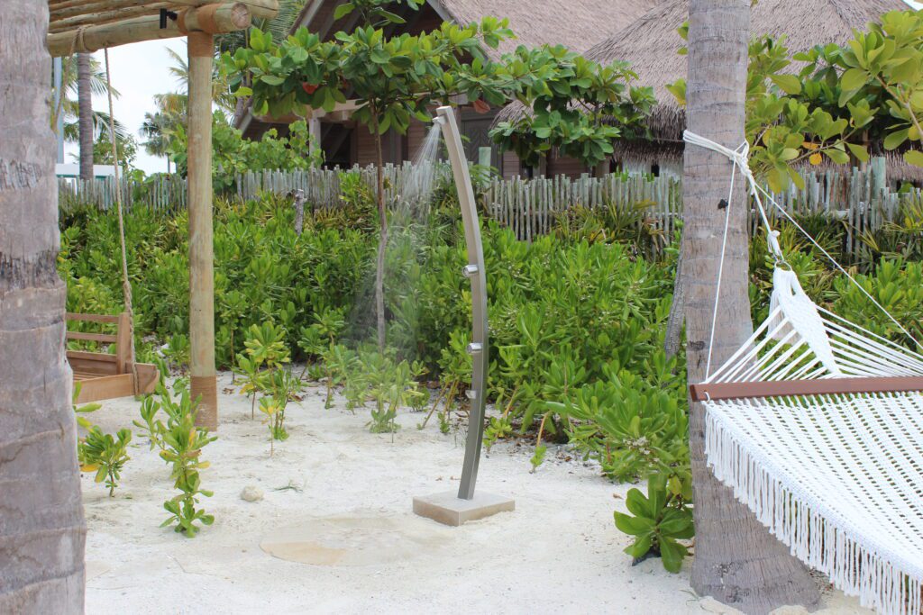 Why Every Resort Needs a Rainware Outdoor Shower